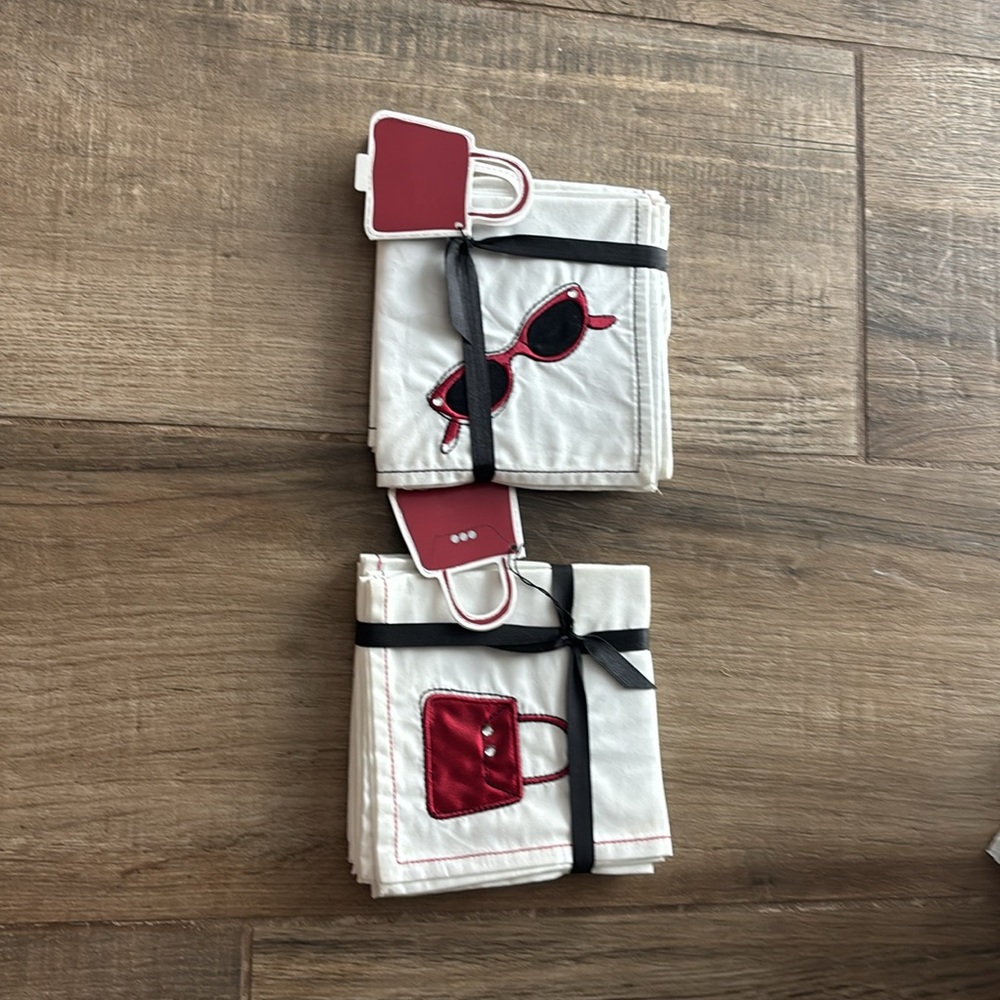 2 sets of 4 cocktail Napkins with embroidered designs